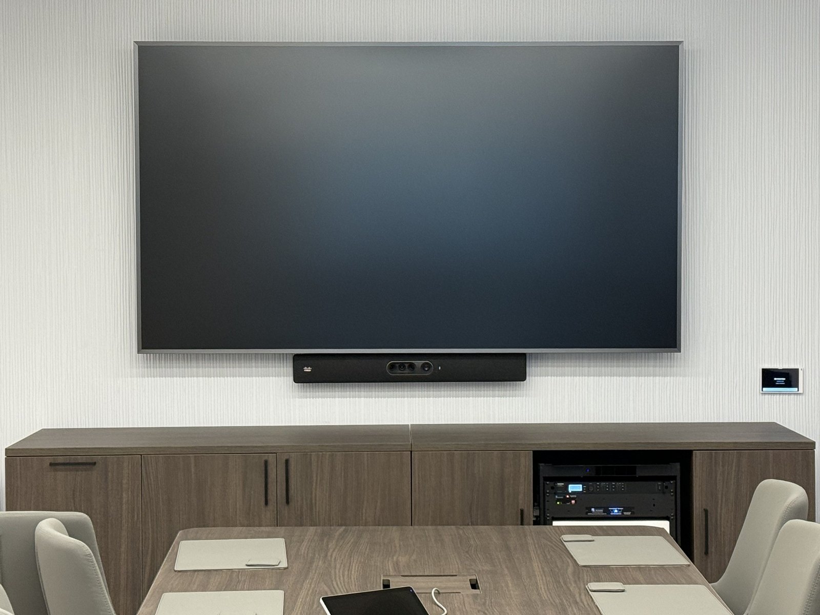 Boardroom display, video bar and credenza rack, installed level